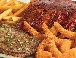 6 oz Rib Eye* & St. Louis Ribs